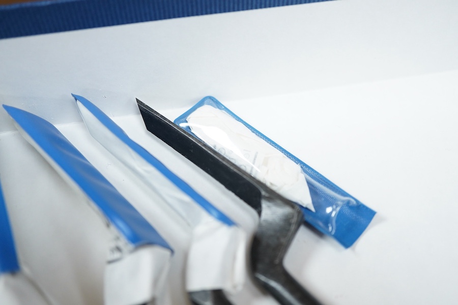 Four sets of Japanese chisels, including a set of six Kote Nomi cranked neck trowel chisels, a set of seven mortise chisels, and two other cabinetmakers sets (22 in total), plus two Japanese hammers/mallets